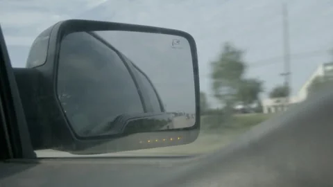 Side Mirror Reflection from Moving Truck Driving on Highway Stock Footage 343881862