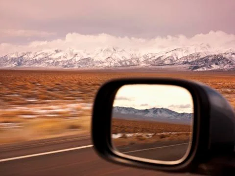 Side mirror shot from interior of car Stock Photos