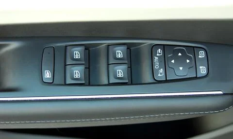 Side mirror switch control and window button Stock Photos