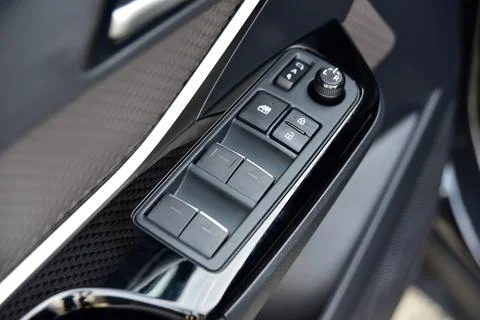Side mirror switch control and window button Stock Photos