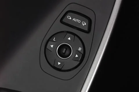 Side mirror switch control Stock Photos