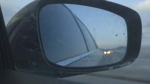Side Mirror of Vehicle Driving on the Highway Video stock 147692003