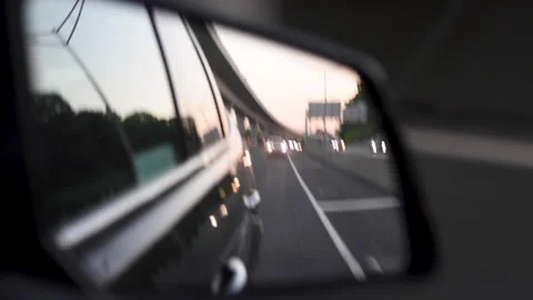Side mirror view driving on the highway Stock Footage 197104289