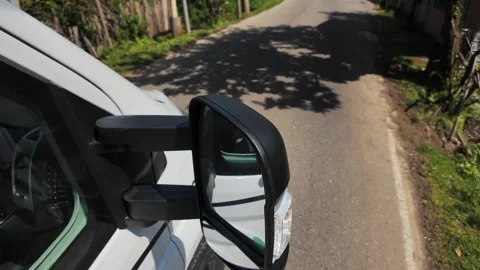 Side Mirror View from Moving Camper Van. Road Trip Through Countryside. Stock Footage 336560366