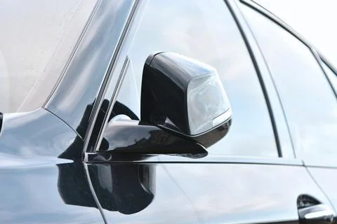 The side mirrors are foldable and electrically adjustable Stock Photos
