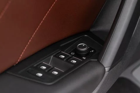 Side mirrors control panel on side door. Stock-Fotos