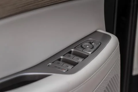 Side mirrors control panel on side door. Stock Photos