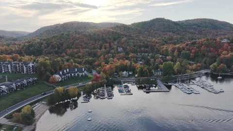 Side Motion Aerial Drone Shot of Marina and Lake Near Mont-Tremblant in Autumn Stock Footage 321378568