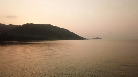 Side moving aerial view on mountains and sea coast on Phangan island, Thailand Stock Footage 88016880