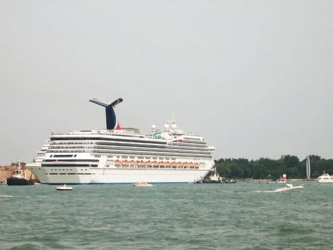 The side of a multi-deck cruise liner. Side view on sky background Stock Photos