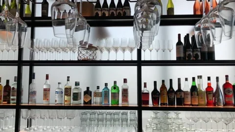 Side pan of the alcohol bottles in the bar display Stock Footage 148027802