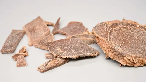 Side pan view herb CuEZhu or Curcumae Rhizoma or Vinegar Processed Blue Turme Stock Footage 147922022