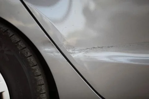 Side panel and wheel of a car Stock Photos