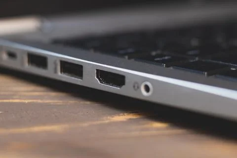 Side panel on a laptop. Different ports for connection. Stock Photos