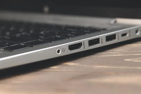 Side panel on a laptop. Different ports for connection. Stock Photos