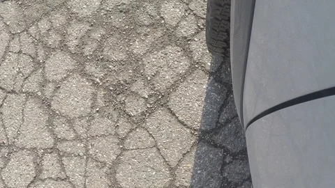 Side panel shot of car and tire Stock Footage 124872289