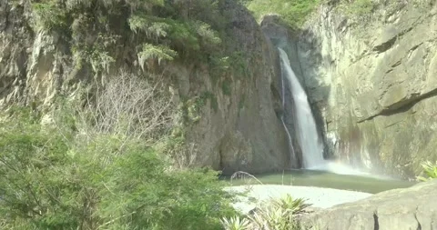 Side panning drone footage waterfall landscape in Jarabacoa Dominican Republi Stock Footage 133267637