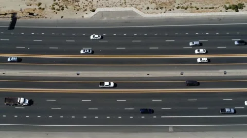 Side panning shot of Highway 14 near Sierra Hwy offramp Stock Footage 218555801