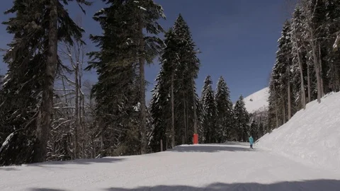 Side panning on a ski track in the mountains with a view of the winter landscape Stock Footage 127589523