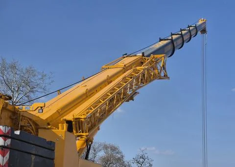 Side Perspective of 150-ton Mobile Crane with Extended Telescopic Boom Stock Photos