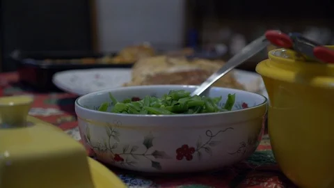 A side of piping hot green beans on the dinner table Stock Footage 100275750