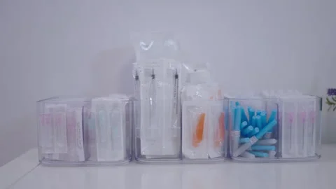 Side plan of various disposable clinical accessories Stock Footage 255385109