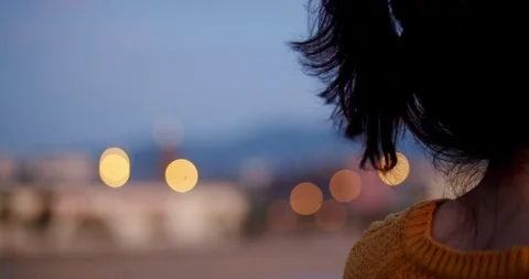 Side portrait of cute natural young woman enjoying alone urban early morning Stock Footage 120942976