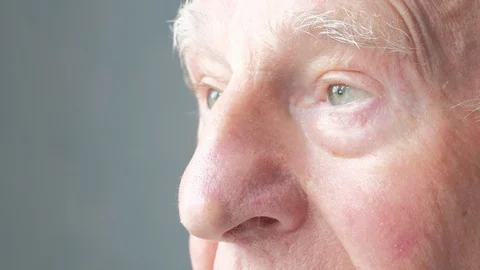 Side portrait of a senior man's eyes Video stock 86774792