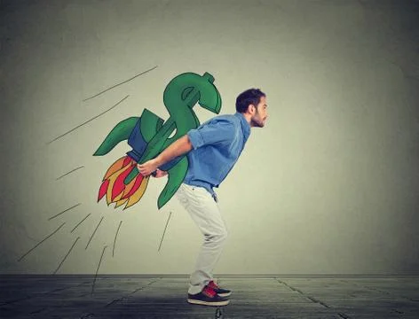 Side profile of ambitious young man with high risky financial goals Stock Photos