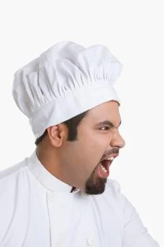 Side profile of chef angry Stock Photos