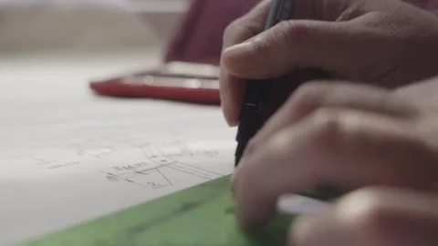Side Profile of Designer Using Traditional Drafting Tools for Concept Sketch Stock-Footage 341926827