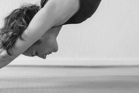 Side Profile in Downward Facing Dog Pose Fotos de archivo