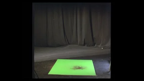 Side Profile Ground Impact Dust Compositing Element On Green Screen Stock Footage 335384556