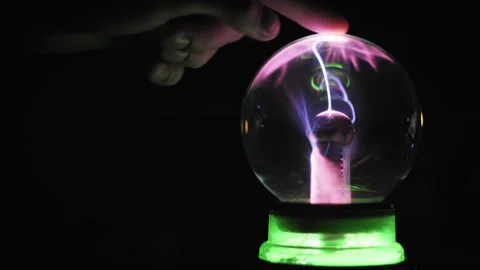 Side Profile Hand Interacts With Plasma Sphere 스톡 동영상 329808424