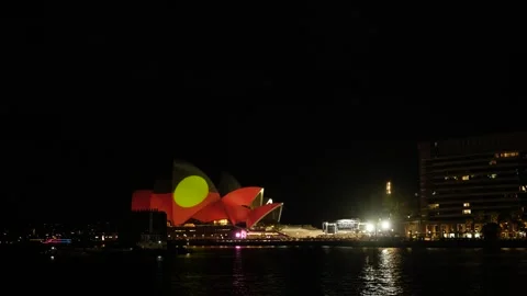Side profile of Sydney Opera House with Aboriginal symbol 6K Stock Footage 330512117