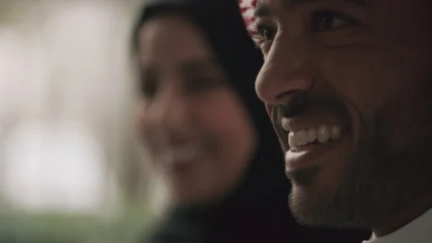 Side Profiles of Saudi couple smiling. Stock Footage 105803424