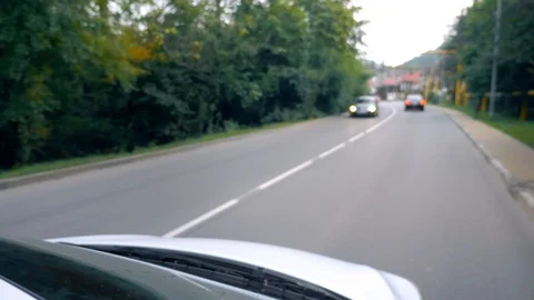 Side rear-view mirror of a car while driving on a highway. Stock Footage 117543640