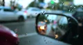 Side rear view mirror rainy weather, wet cars road city HD Footage