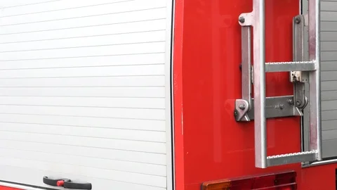 Side of a red fire truck Видео 108338198