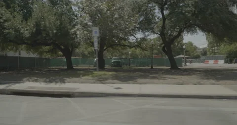Side right driving plate - East Dean Keaton Street at San Jacinto Boulevard, Stock Footage 253499577