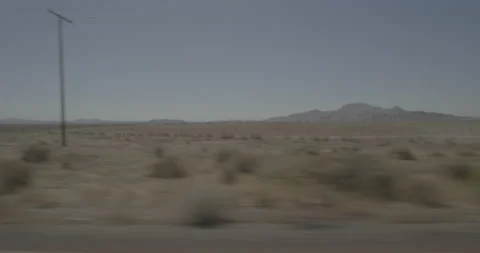 Side right driving plate - Highway 58 at Lone Butte Road, Mojave Stock Footage 293711311