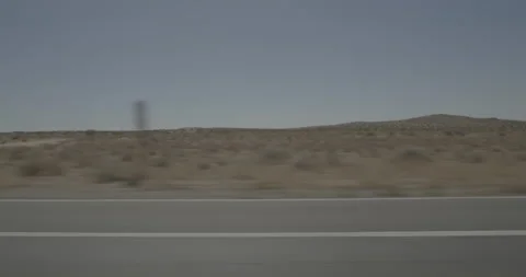 Side right driving plate - Highway 58 at 55th Street, California City Stock Footage 293715085
