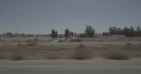 Side right driving plate - Highway 58 at Dennis Street, Boron Stock Footage 293724115