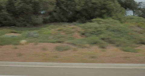 Side right driving plate - PCH at Crystal Cove State Park, Newport Beach Stock Footage 101762759