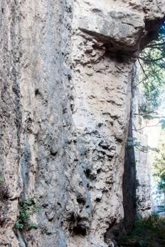 Side of a Rough Stone Cliff Stock Photos