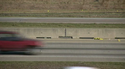 Side shot of fast moving traffic on a sunny day Stock-Footage 360837
