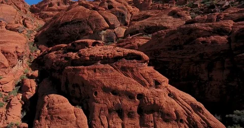 Side shot flying through Red Rock Canyon, Calico hills Stock Footage 73530012