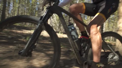 Side Shot Of Mountain Biker On Mountain Trail 스톡 동영상 105885465