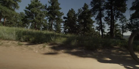 Side Shot Of Mountain Biker On Mountain Trail 스톡 동영상 105887420