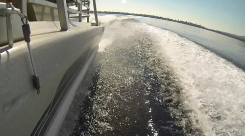 Side Shot of Moving Boat Wake on Jenny's Lake Stock Footage 34690390